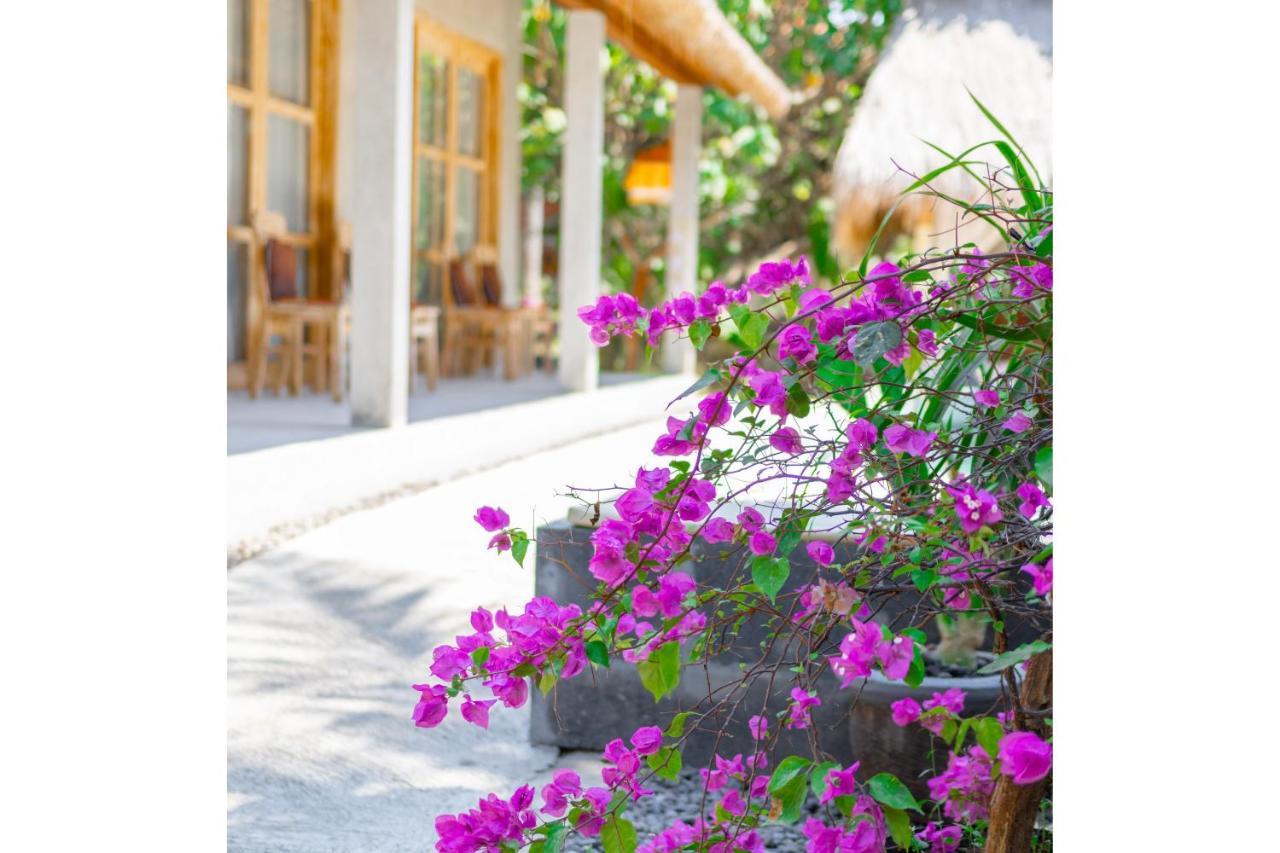Golden Garuda Cottages Polilit Exteriör bild