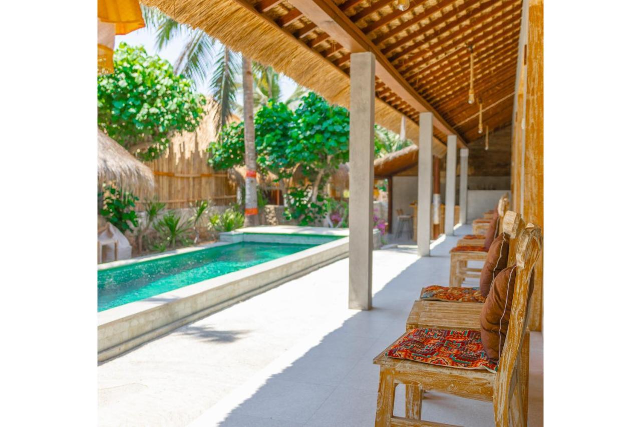 Golden Garuda Cottages Polilit Exteriör bild