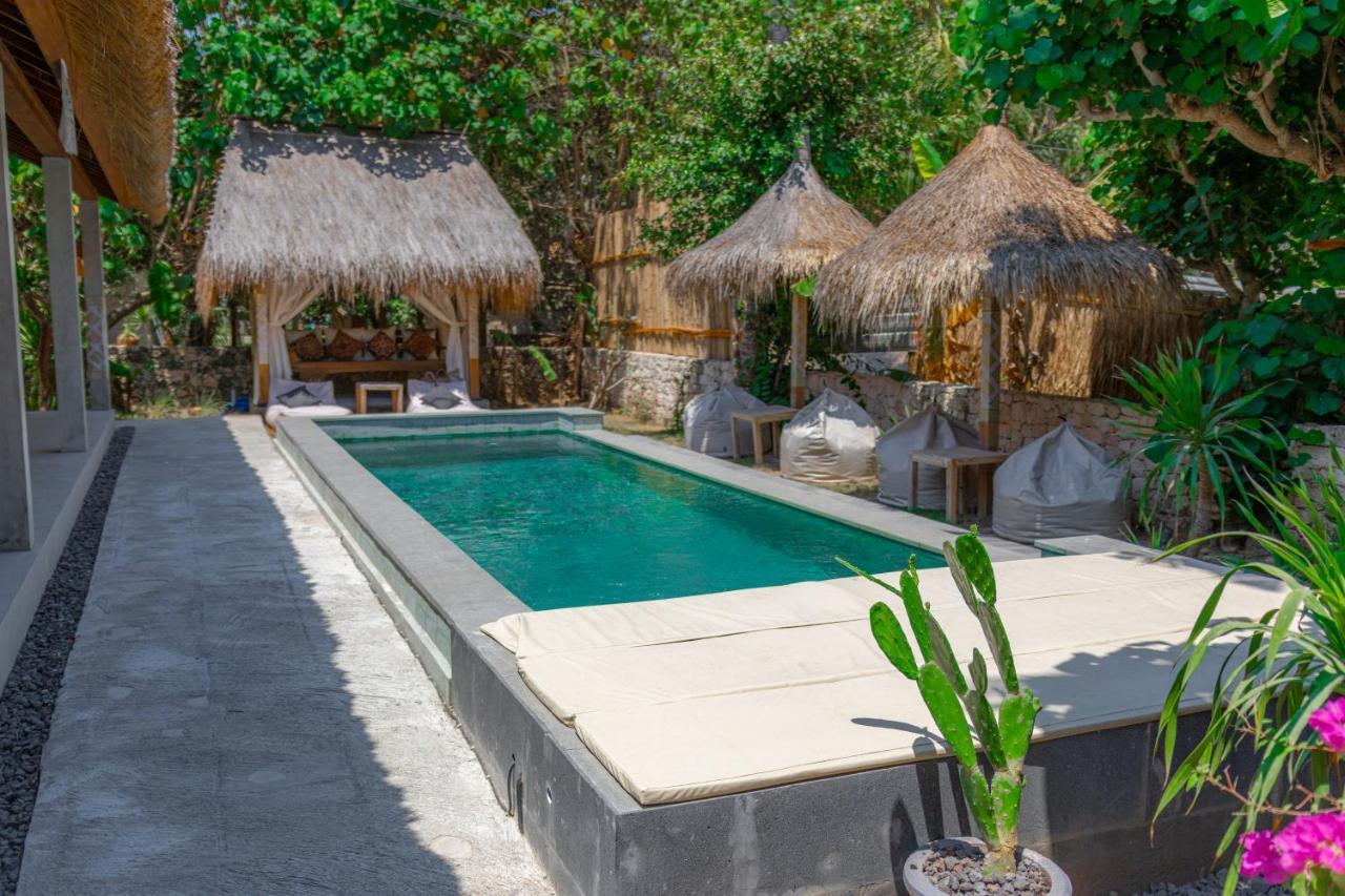 Golden Garuda Cottages Polilit Exteriör bild