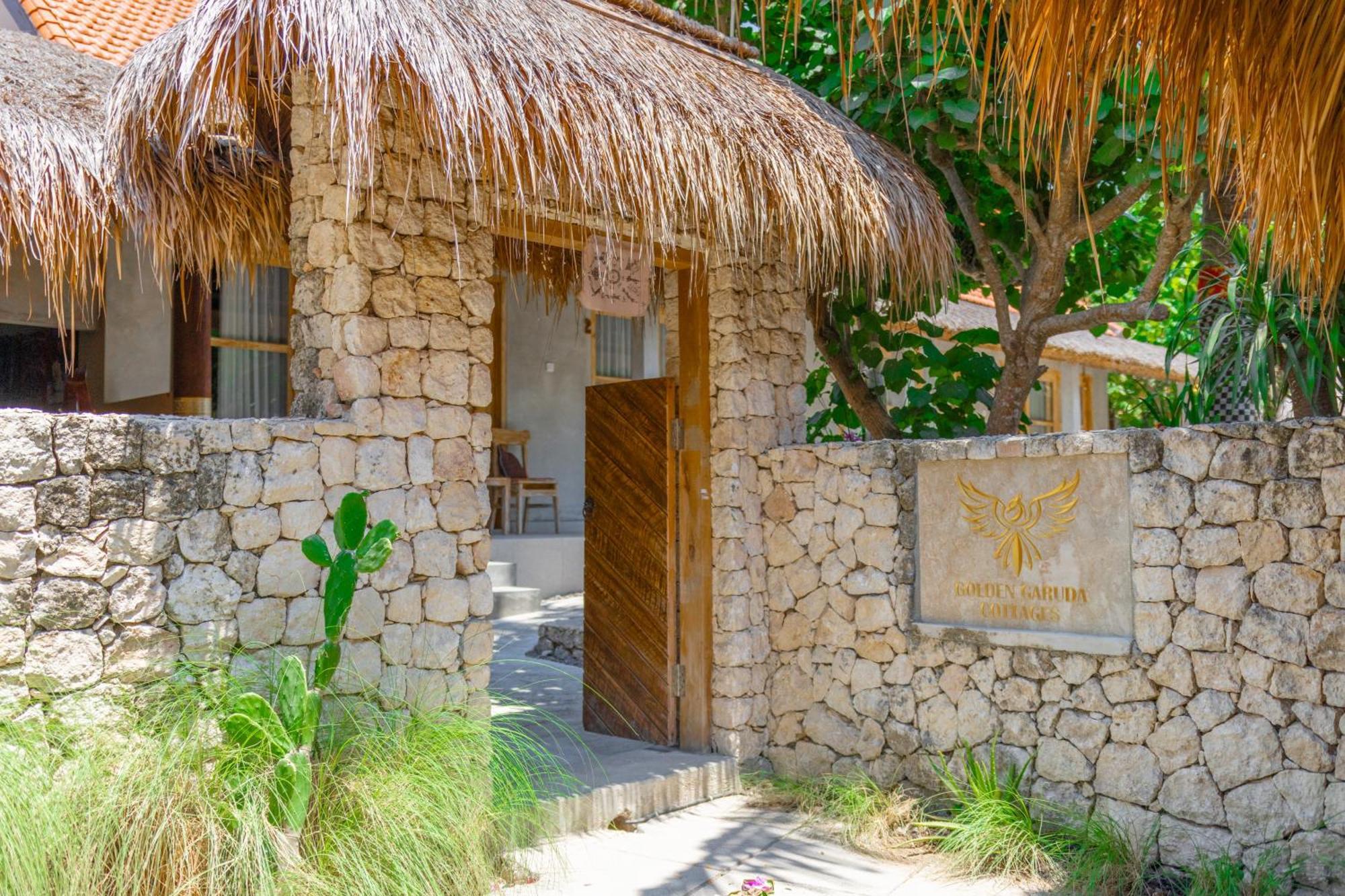 Golden Garuda Cottages Polilit Exteriör bild