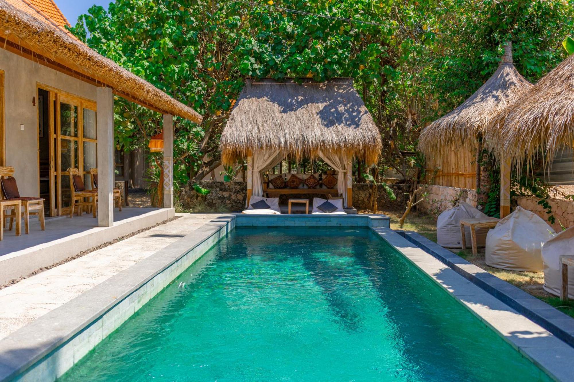 Golden Garuda Cottages Polilit Exteriör bild