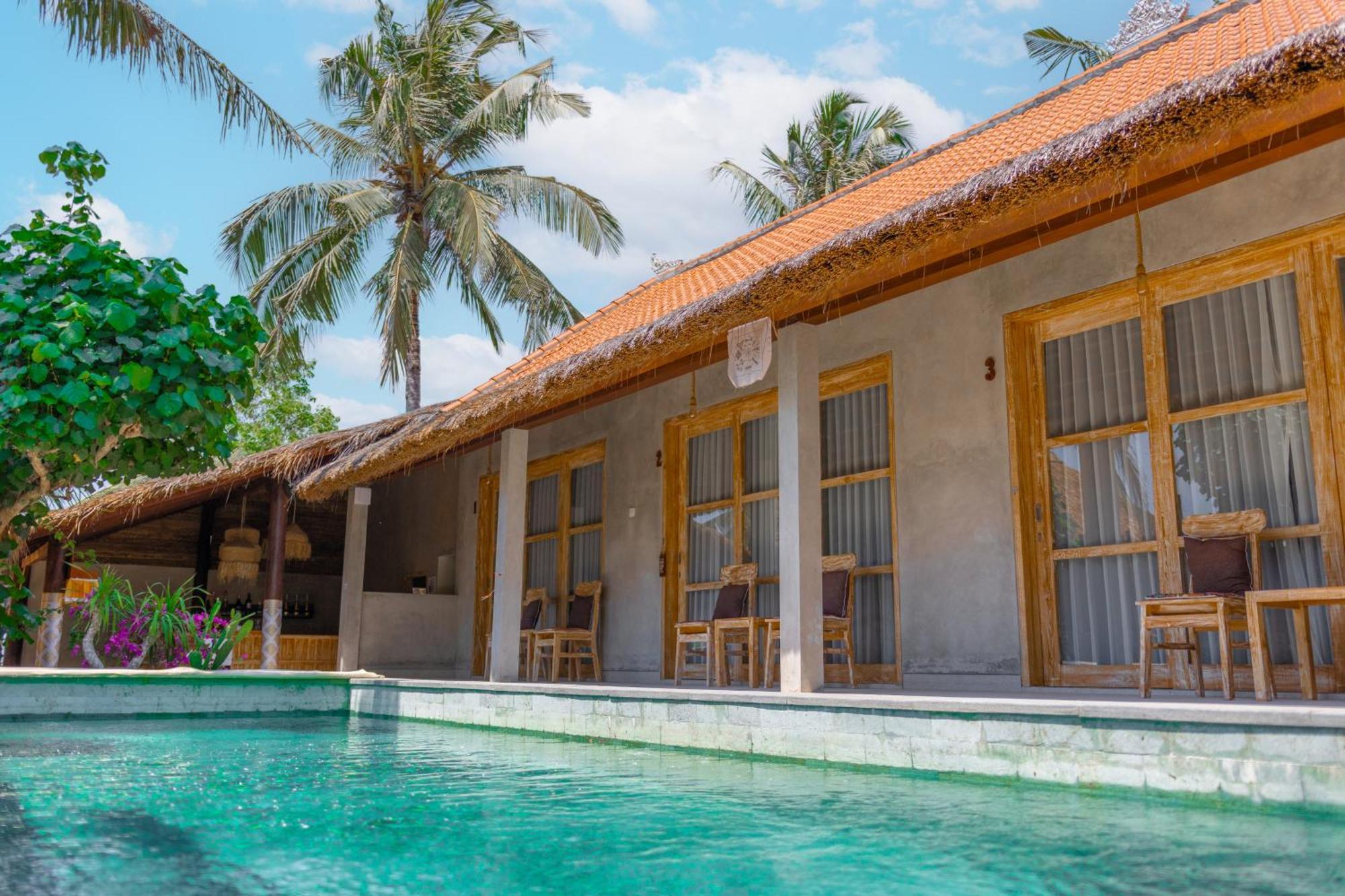 Golden Garuda Cottages Polilit Exteriör bild